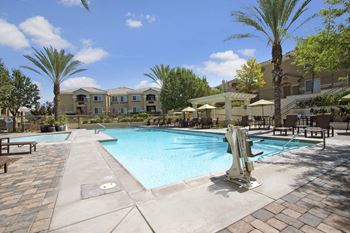 Resort-inspired pool with sunbathing deck